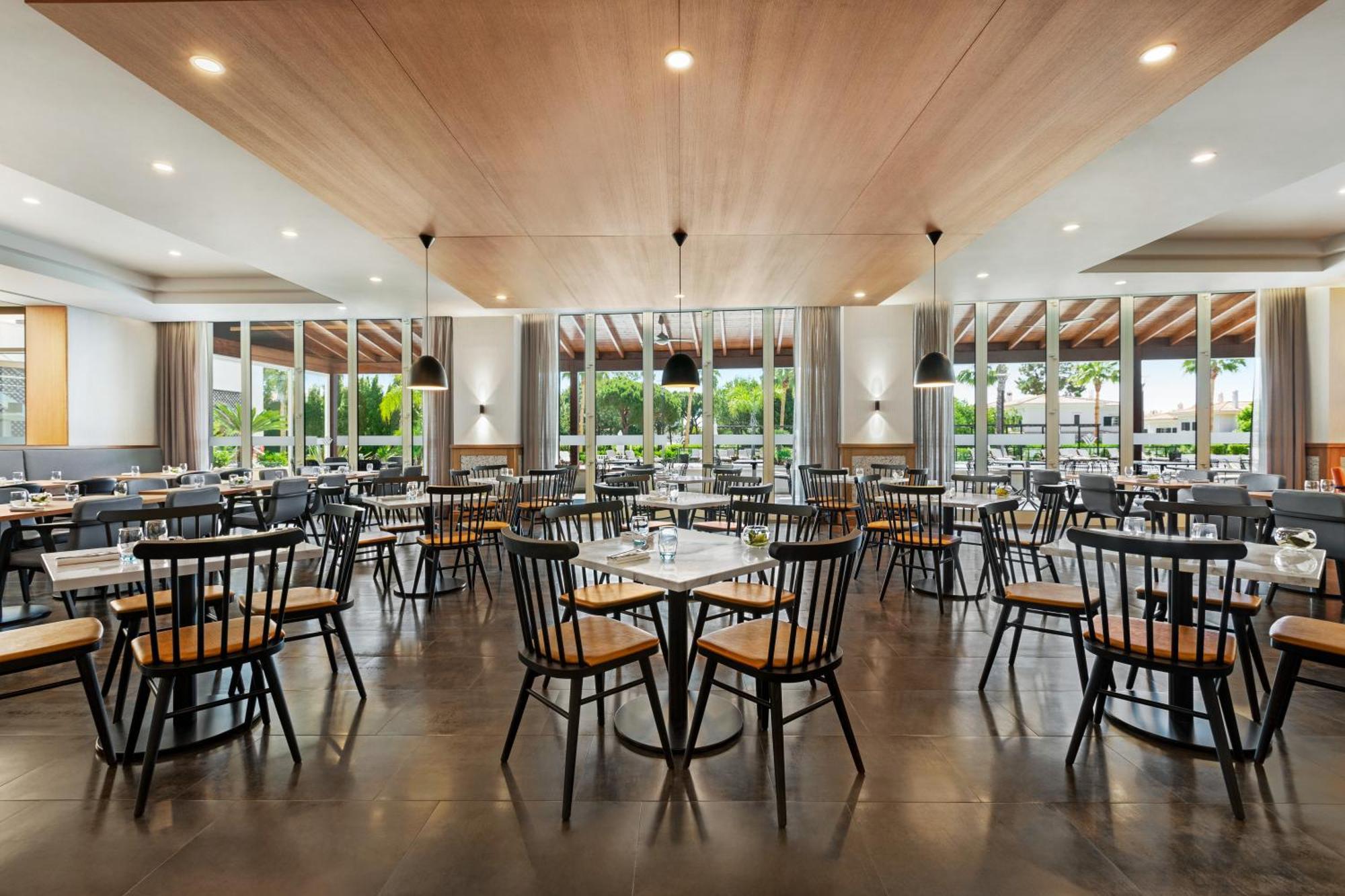 Wyndham Grand Algarve Otel Quinta do Lago Dış mekan fotoğraf The interior of the restaurant